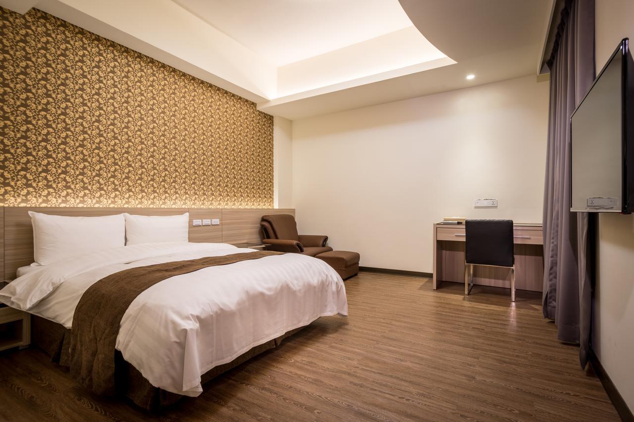 Midu Business Hotel Xiluo Экстерьер фото