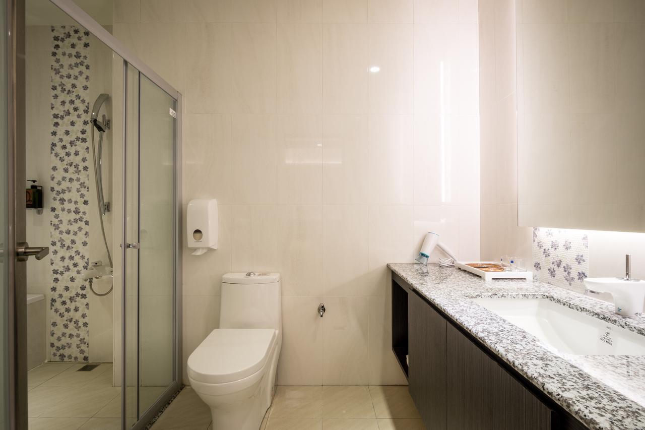 Midu Business Hotel Xiluo Экстерьер фото