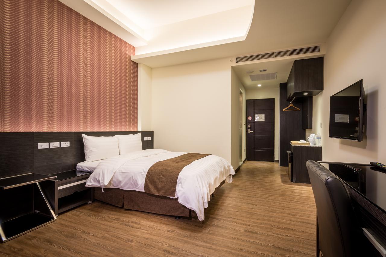 Midu Business Hotel Xiluo Экстерьер фото