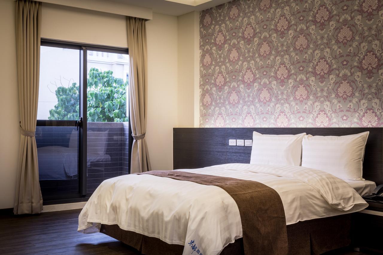 Midu Business Hotel Xiluo Экстерьер фото