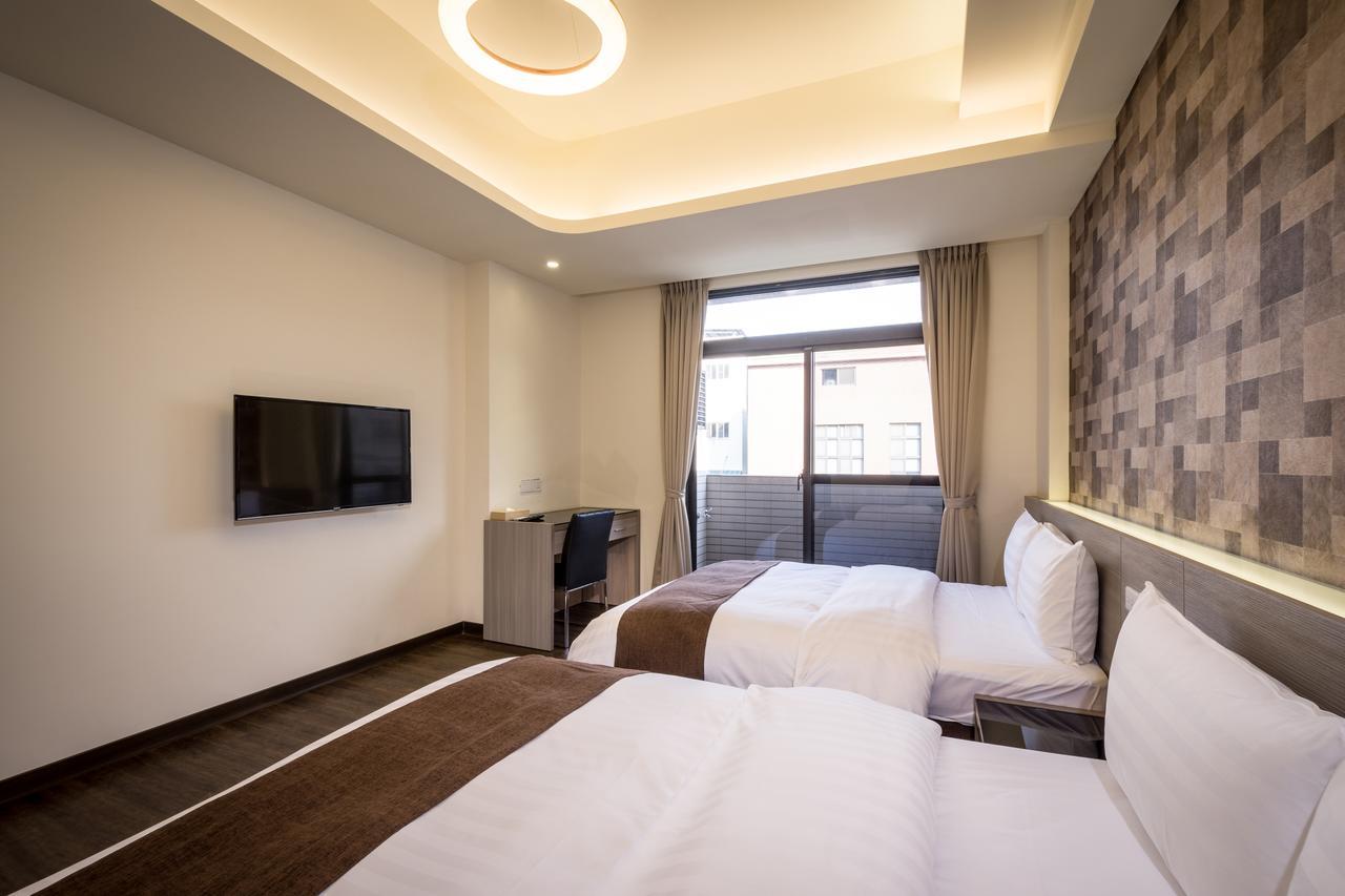Midu Business Hotel Xiluo Экстерьер фото