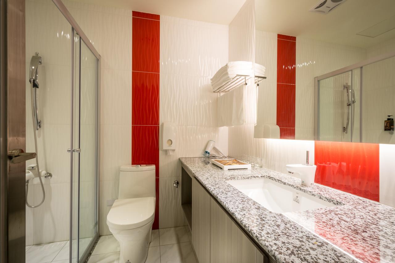 Midu Business Hotel Xiluo Экстерьер фото