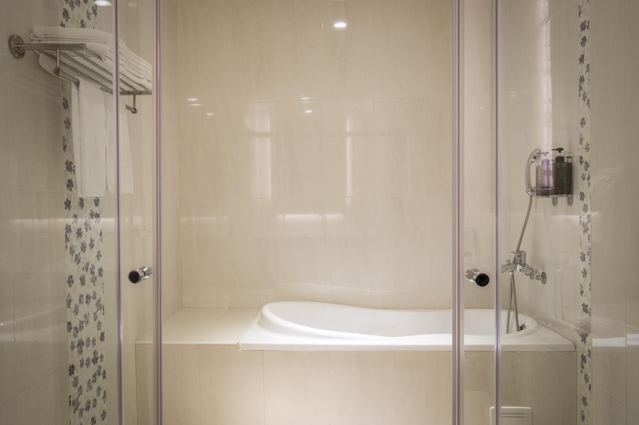 Midu Business Hotel Xiluo Экстерьер фото